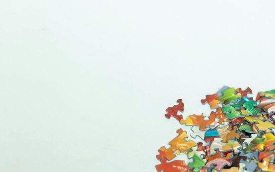 Puzzle pieces connecting, symbolizing a winning Upwork proposal strategy.