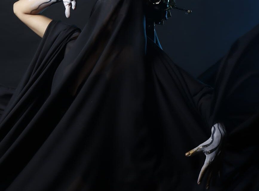 Abstract representation of gold coins flowing, symbolizing the potential of niche website passive income.