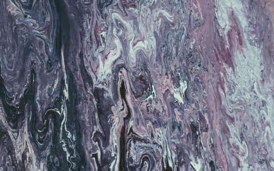 Vibrant abstract art swirling with colorful patterns, representing the creative potential of print-on-demand for artists.