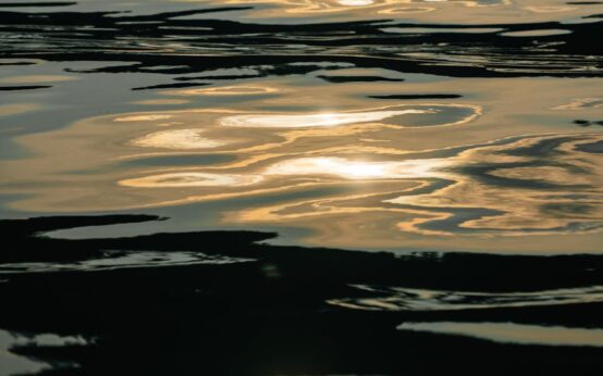 Abstract reflections of a vibrant sunset capturing the essence of the sunset stroll art.