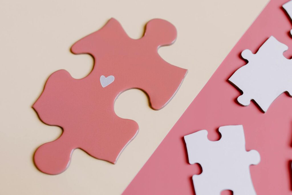 Puzzle pieces fitting together, symbolizing the process of finding the right client for your freelance services.