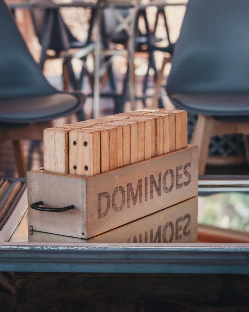 Building blocks illustrating strategic planning for hiring your first employee.