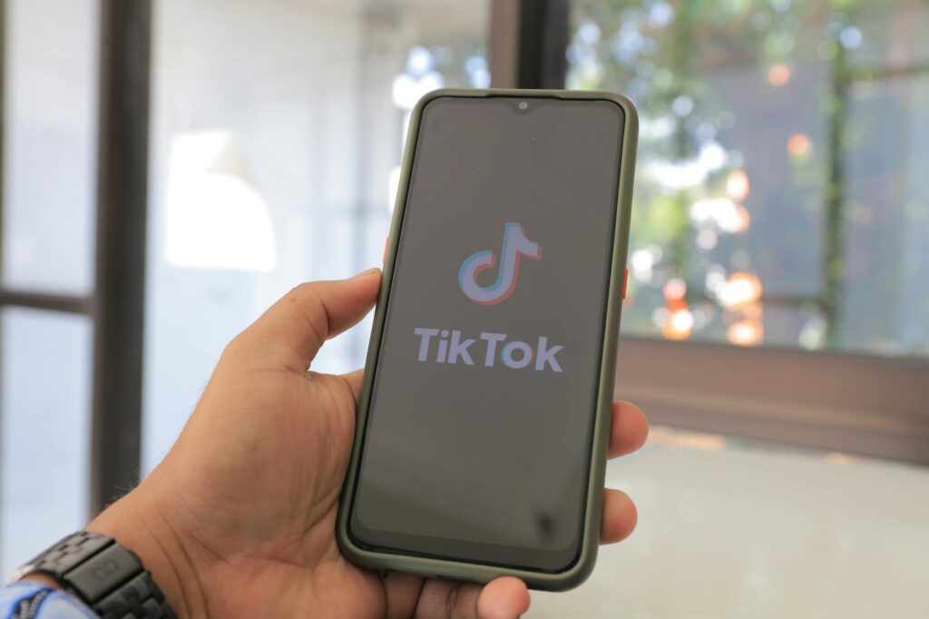 A user's thumb hovering over an app on a smartphone screen, illustrating the process of app testing for cash.