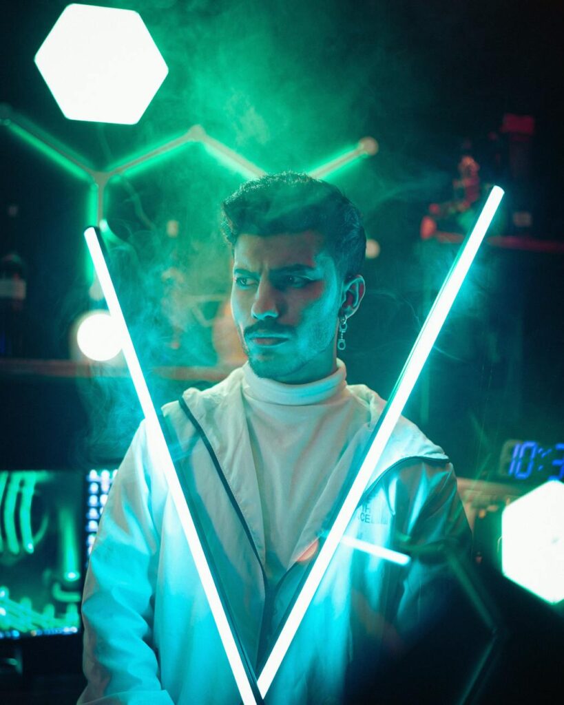 A close-up macro shot of a computer circuit board with streams of light representing data flow.