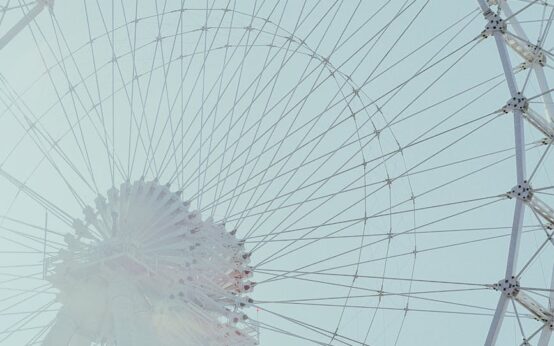 An abstract digital visualization of a neural network with glowing blue nodes and connections.