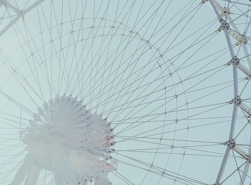 An abstract digital visualization of a neural network with glowing blue nodes and connections.