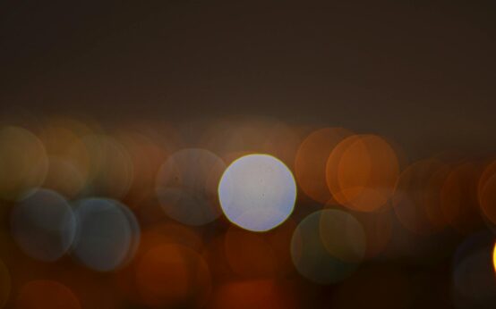 An abstract digital visualization of a neural network with interconnected glowing nodes and lines.