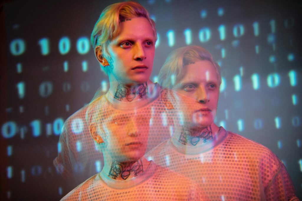 An abstract visualization of glowing blue lines connecting points on a dark world map, representing a global network.