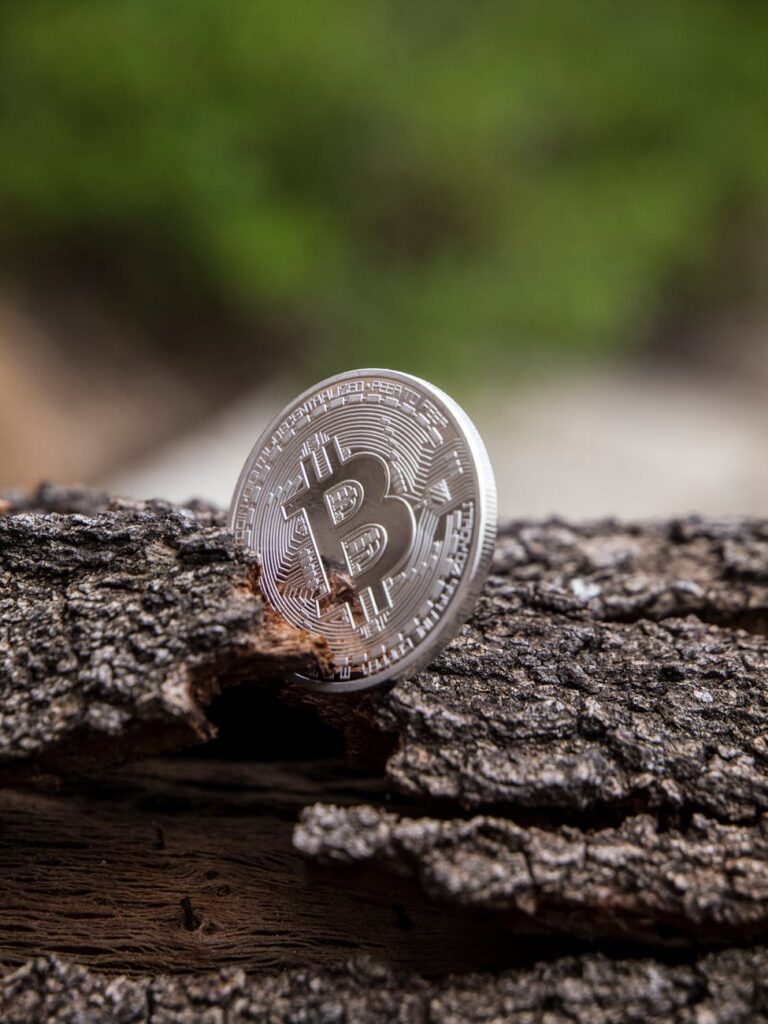 A close-up view of glowing blue and purple blocks forming a digital chain, symbolizing blockchain tech.