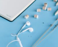 A freelance transcriptionist working comfortably from her home office on a laptop.