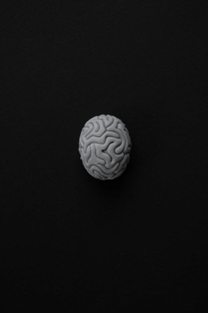A glowing, digital representation of a human brain, illustrating the concept of artificial intelligence.