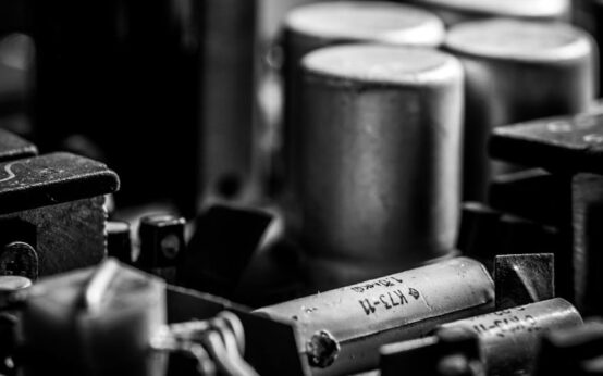 An abstract visualization of the Polkadot Relay Chain connecting multiple parachains in a hub-and-spoke model.