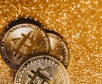 An abstract digital visualization of a glowing blue blockchain network.