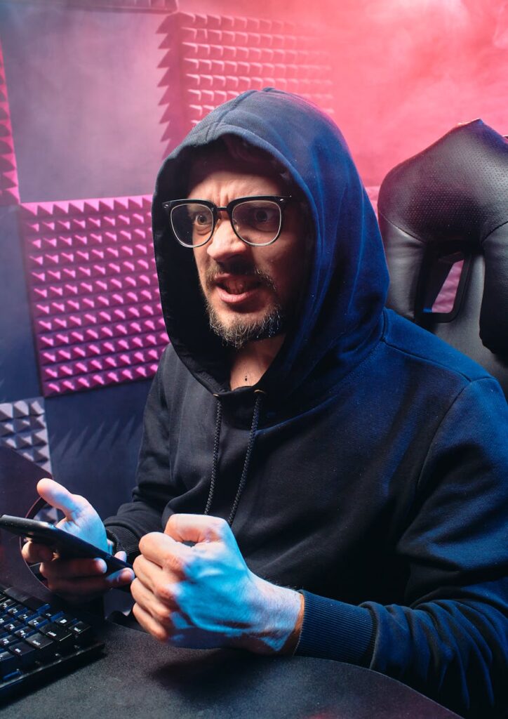 A diverse group of people interacting with a large holographic screen displaying complex data and network charts.