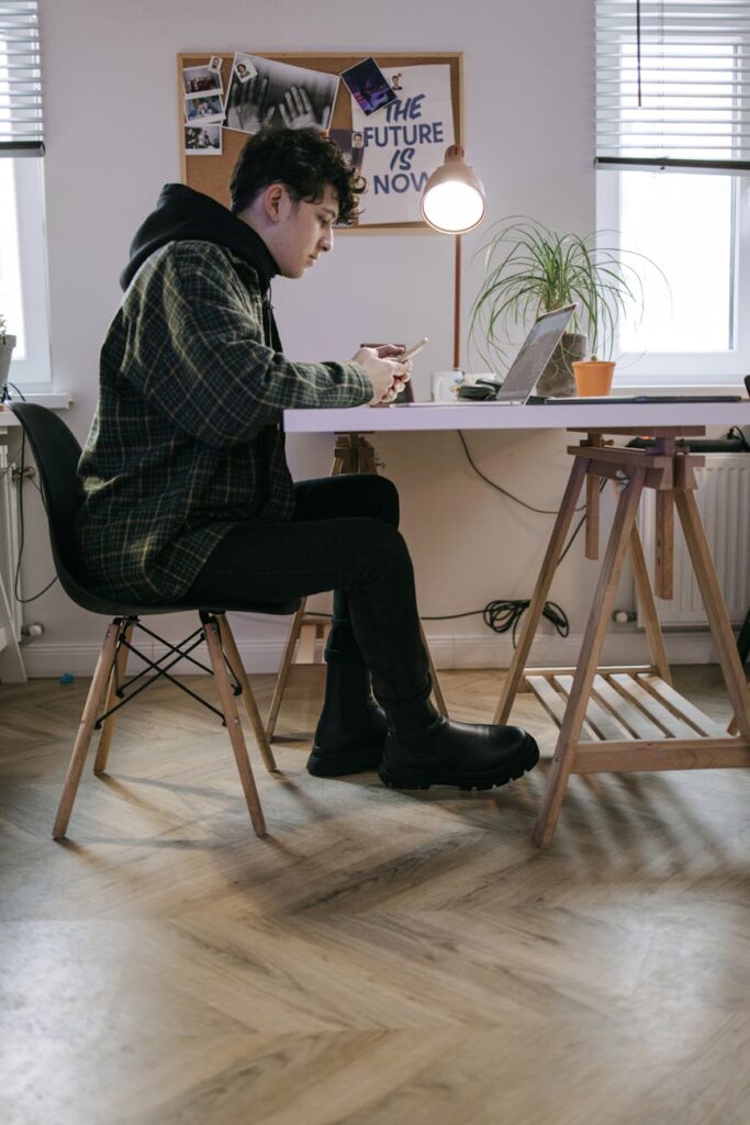 A data scientist thoughtfully analyzing complex algorithmic data on a transparent screen display.