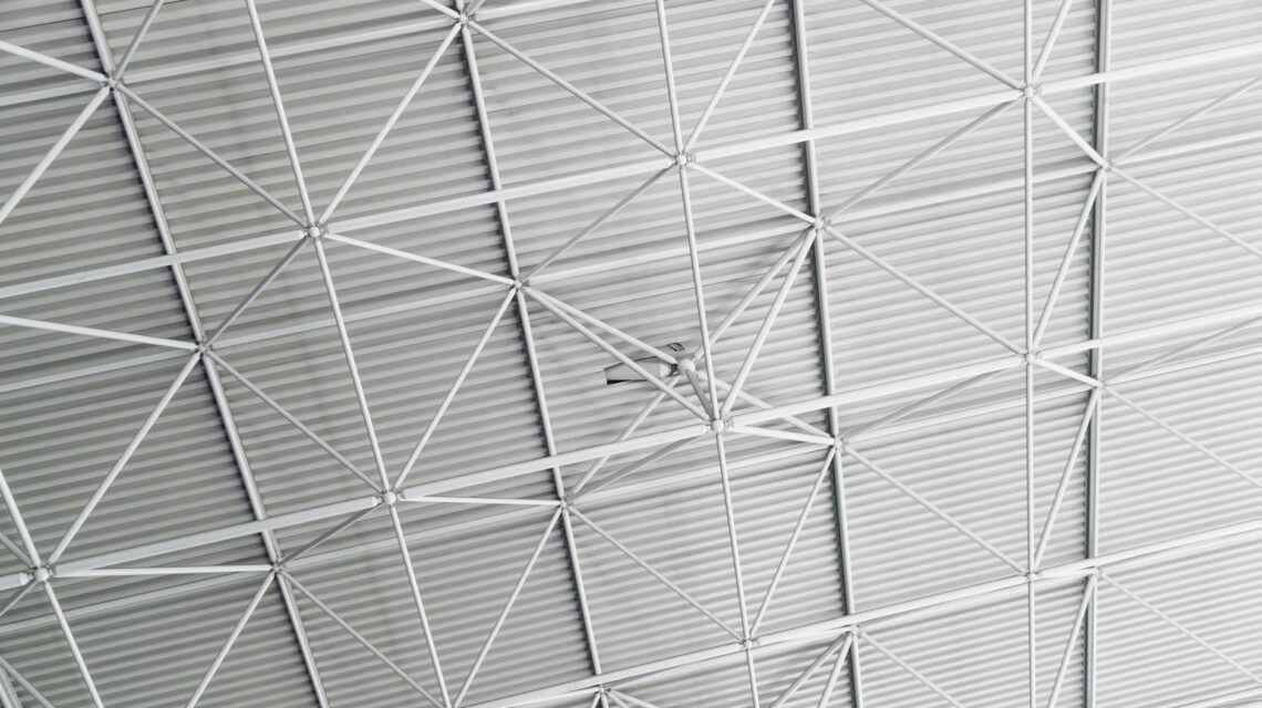 An abstract visualization of a glowing blue and purple neural network, representing artificial intelligence.