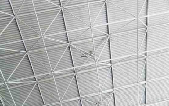 An abstract visualization of a glowing blue and purple neural network, representing artificial intelligence.