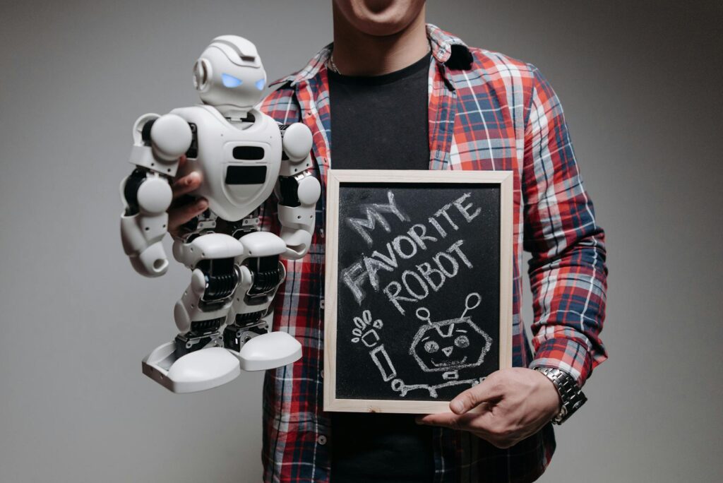 A futuristic humanoid robot touching a floating holographic interface with data charts.
