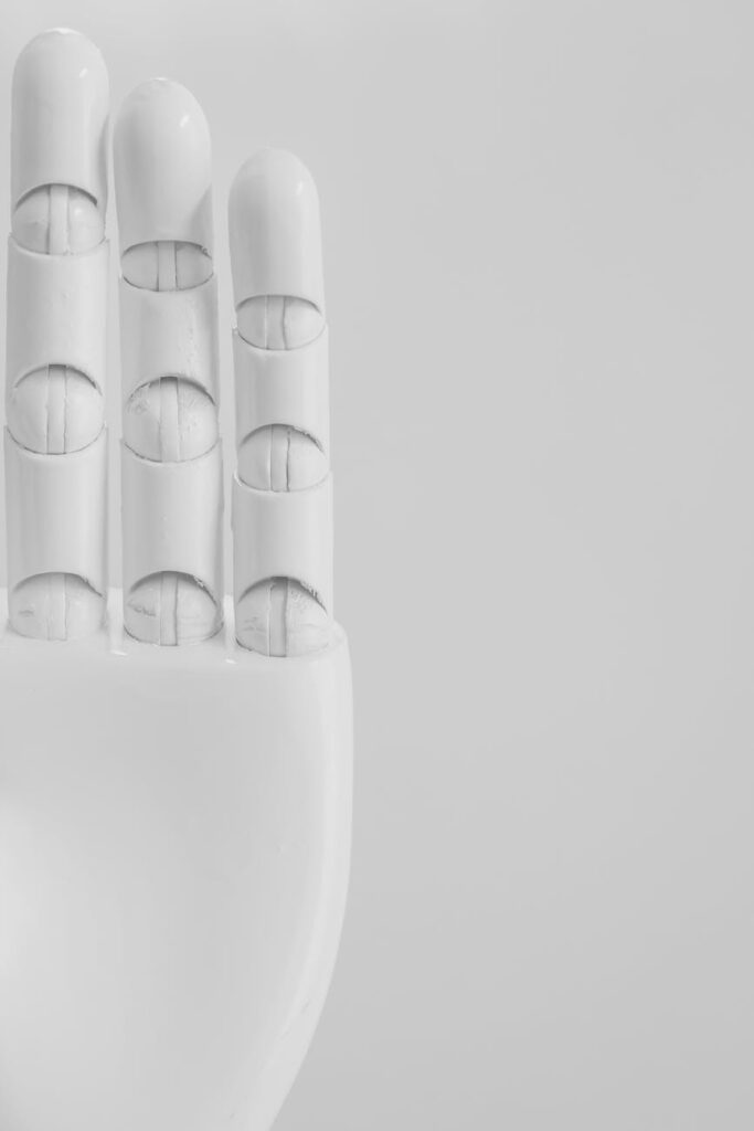 A clean, modern factory floor where robotic arms assemble a product with precision, overseen by digital overlays showing data.
