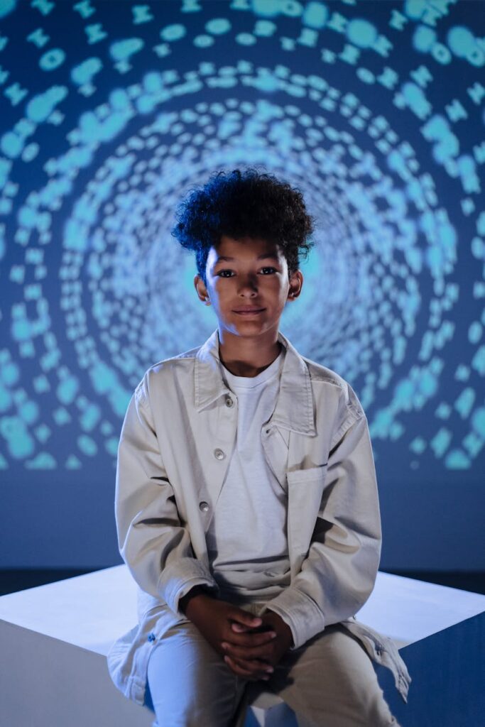 An abstract image showing streams of blue and purple digital data flowing through a dark space.