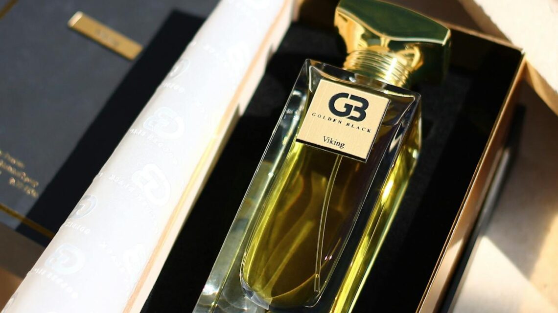 A close-up of a person's hands holding a cereal box and reading the nutrition facts and ingredients list.