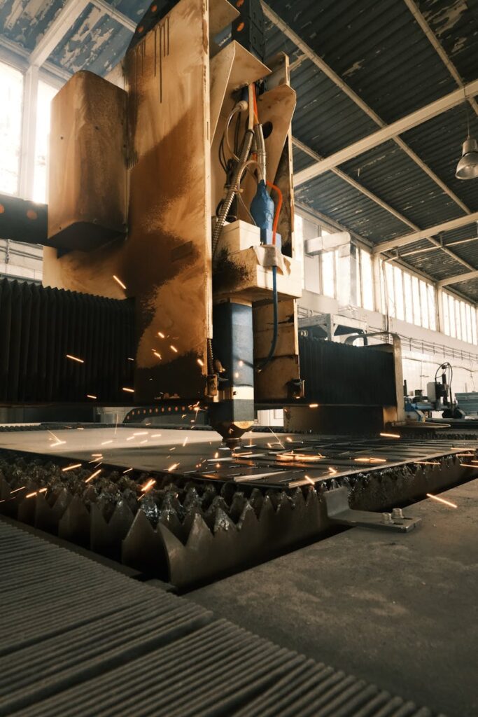 A close-up of a high-tech robotic arm precisely assembling a component on a manufacturing line.