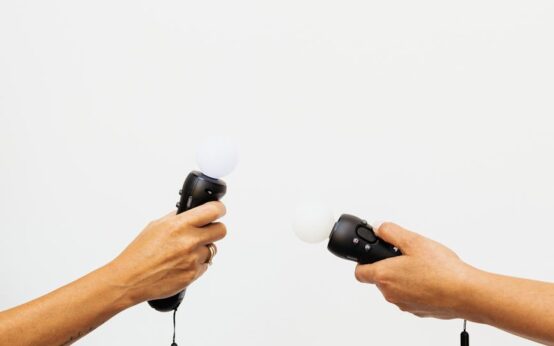 A modern factory floor with glowing digital overlays showing data and analytics, illustrating a digital twin.