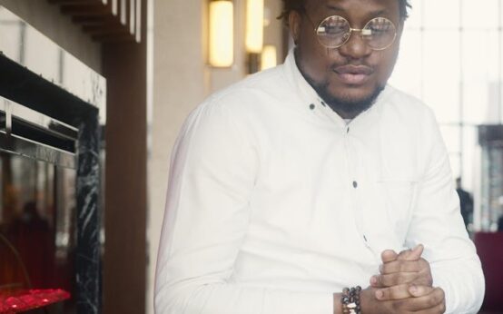 A person working from home, earning money online with their laptop and phone.