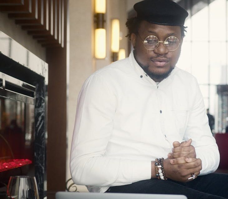 A person working from home, earning money online with their laptop and phone.