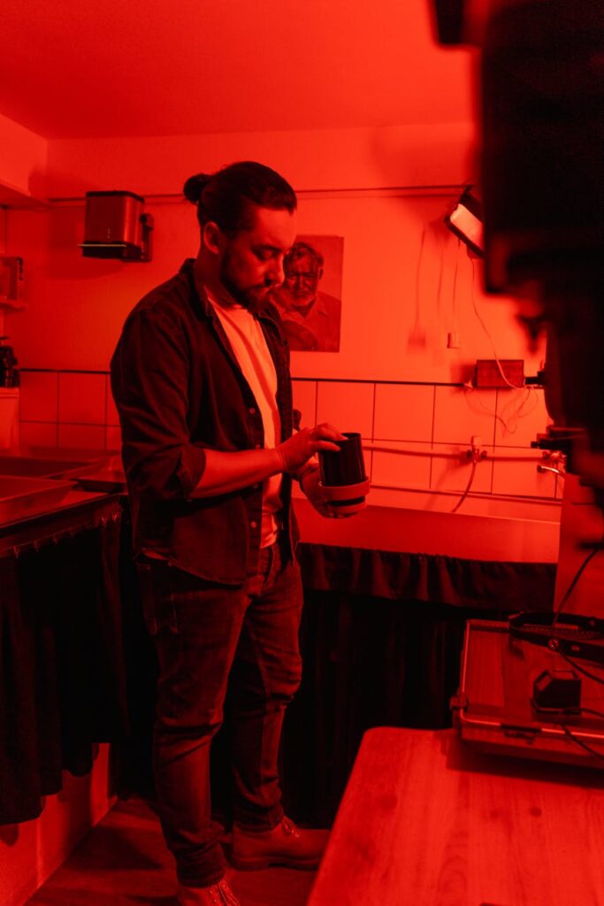 A close-up of a complex business process flowchart drawn on a whiteboard with sticky notes.