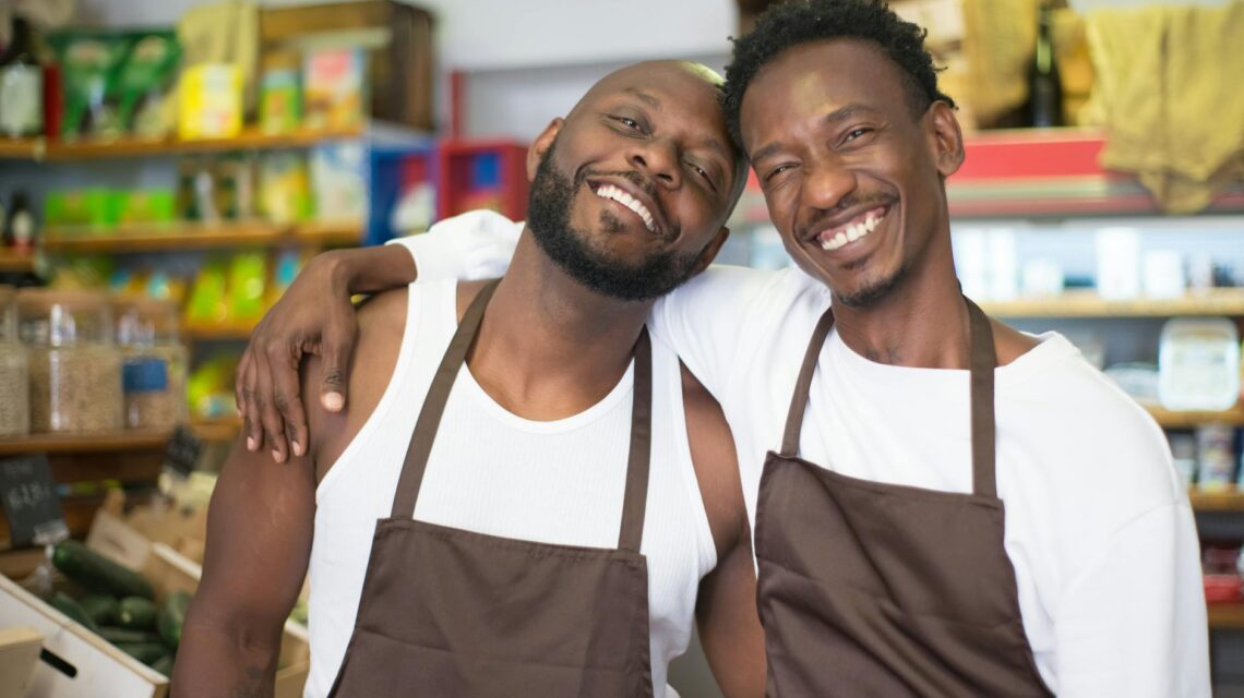 A supermarket aisle filled with brightly colored packages of processed snack foods and cereals.